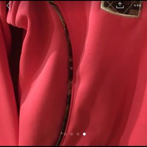 Under Armour pink and camouflage hoodie.
